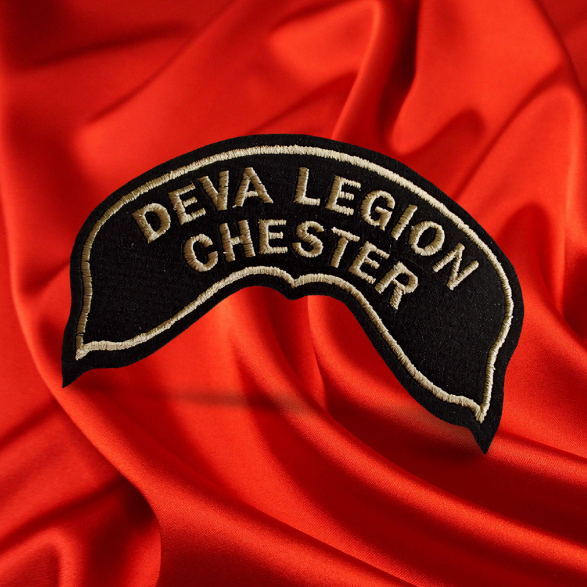 #016 A classic sew‑on cloth rocker patch crafted in traditional style, available in striking gold or sleek silver. Durable stitching and bold lettering make it perfect for jackets or cuts, adding authentic rider identity. A timeless accessory designed to complement any Deva Legion gear.